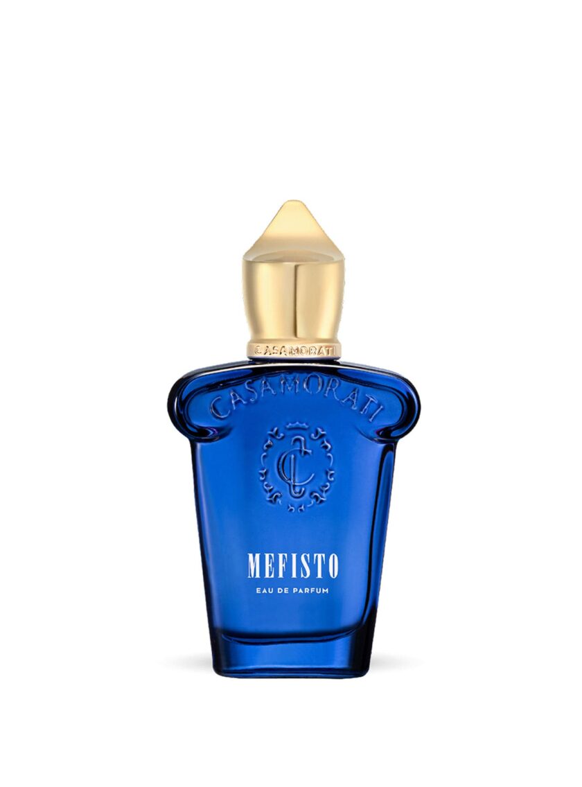 Botella de perfume Mefisto de Casamorati sobre fondo abstracto que representa cítricos y el mar.